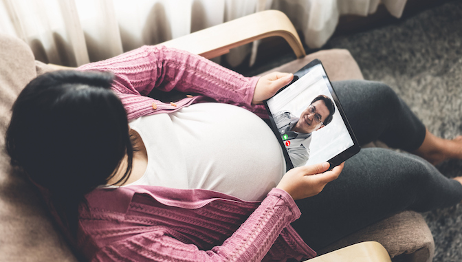 Doctor telemedicine service online video with pregnant woman for prenatal care