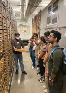 Students in a specimen library