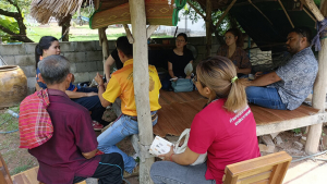 people sitting in hut