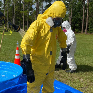 person wearing hazard suit