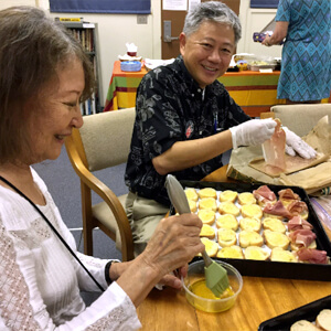 2 people preparing food