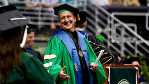 President Lassner smiling at commencement