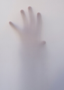 hand reaching out in white haze