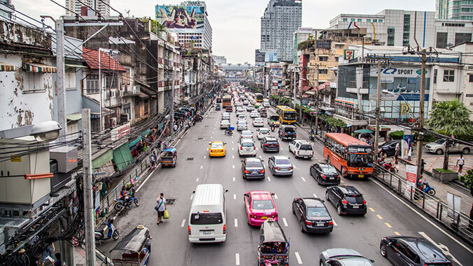 Overhead view of a city street with many cars