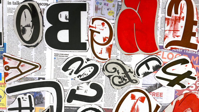 Letter collage on a newspaper art piece