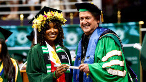 President Lassner with a graduate at commencement