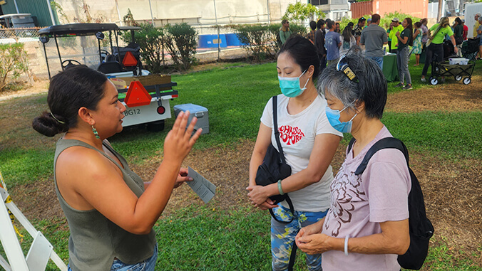 arbor day attendees speaking with expert