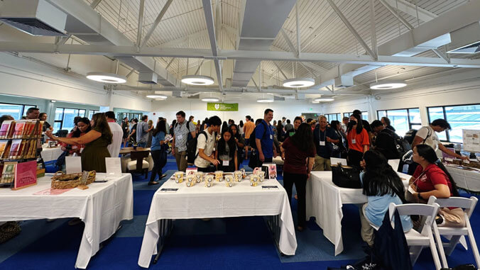 A crowd of people at the opening of the food innovation center