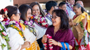 Giving lei to people