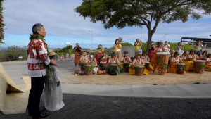 Taupouri Tangaro with musicians and chanters