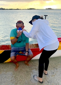paddler getting a mask fitted