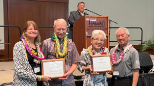 Morton and Tsunoda with their certificates