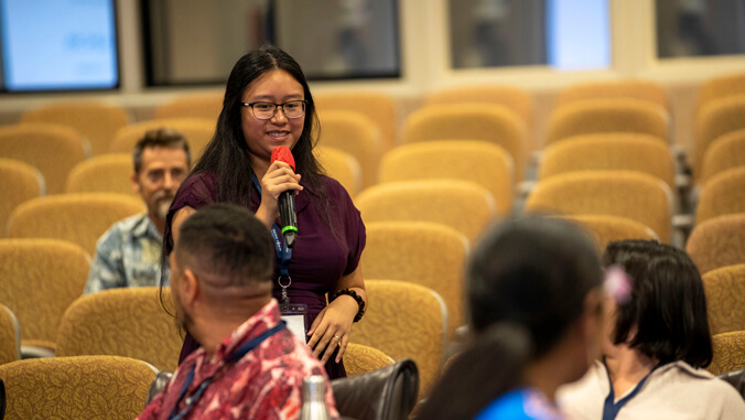 person speaking in a room