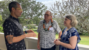 three people talking