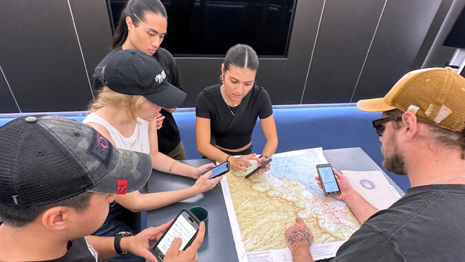 students looking at map