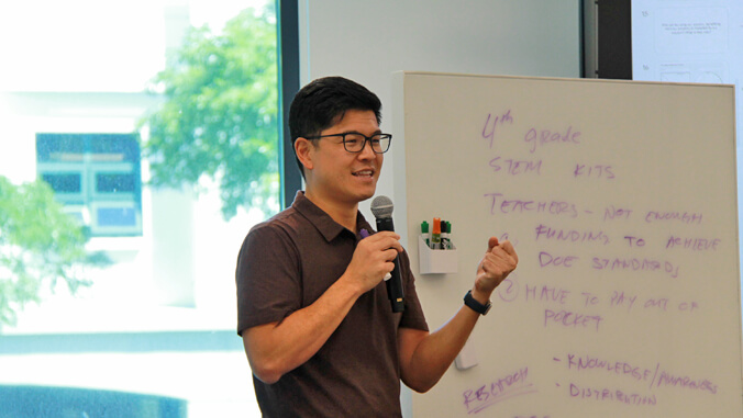 person talking with a microphone
