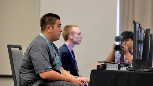 people playing games in front of a television