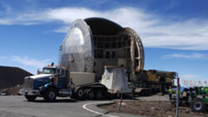 Parts of the Caltech Submillimeter Observatory being removed.