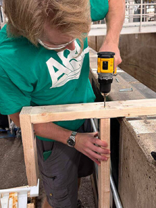 man using a drill