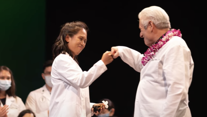 abella with hedges at white coat ceremony