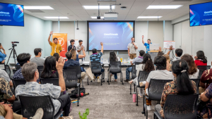 people sitting in a large room