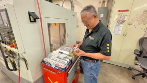 person showing a fabricated tool