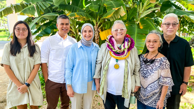 Six smiling people