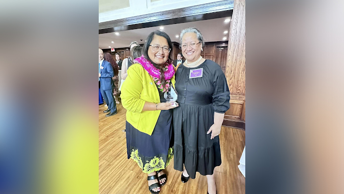 two women smiling