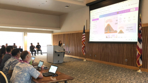 person presenting to a group of judges