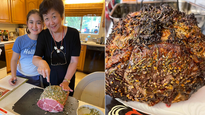 Grandmother and granddaughter preparing a rib roast