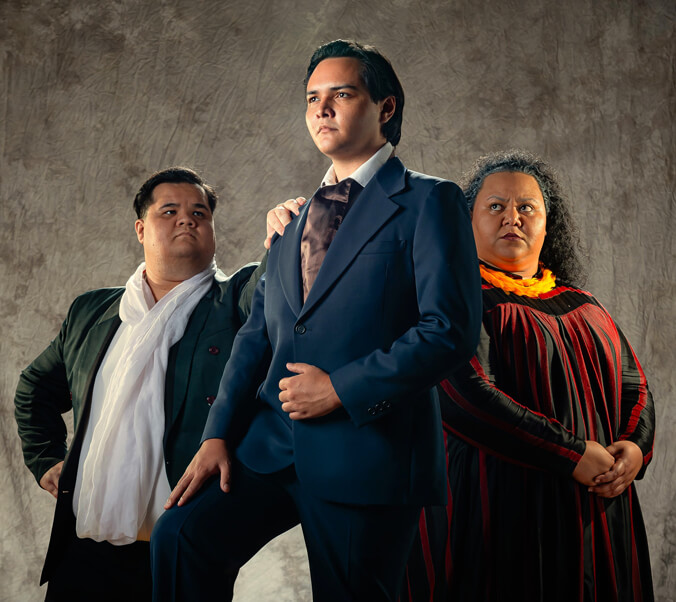 Three people in historical costumes