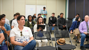 people sitting in a room