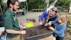 child doing activity with soil