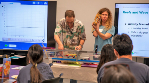 two people demonstrate concept in classroom