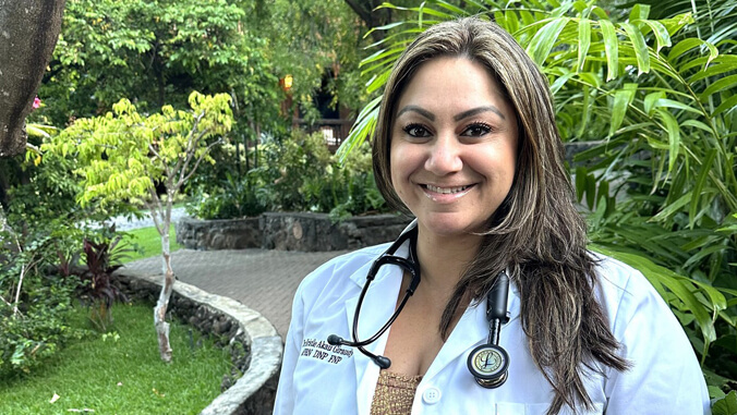 Giraudy in nursing shirt with stethascope