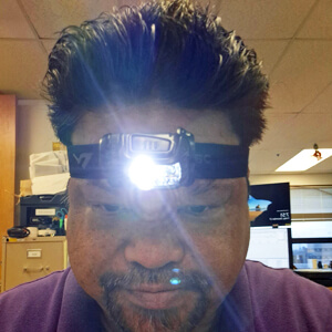 man wearing light on his head