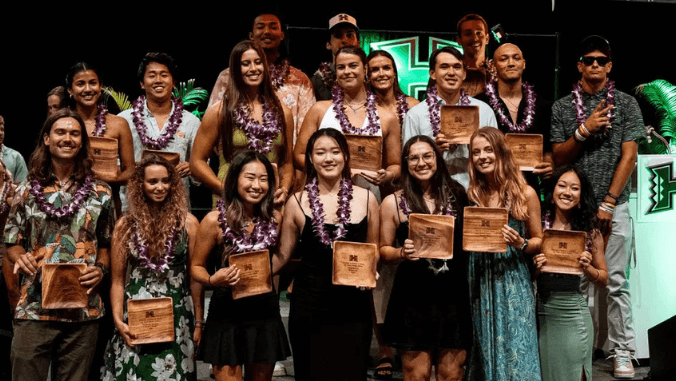 student athletes with awards