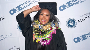 woman in graduation cap and gown