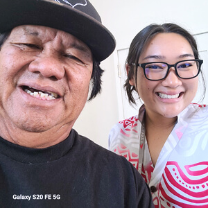2 people taking a selfie