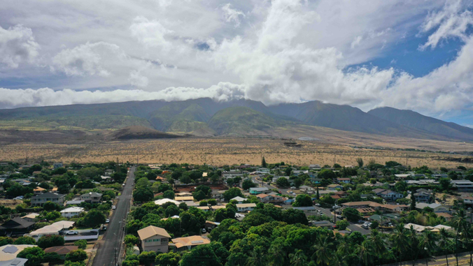 community with homes near a large mountain