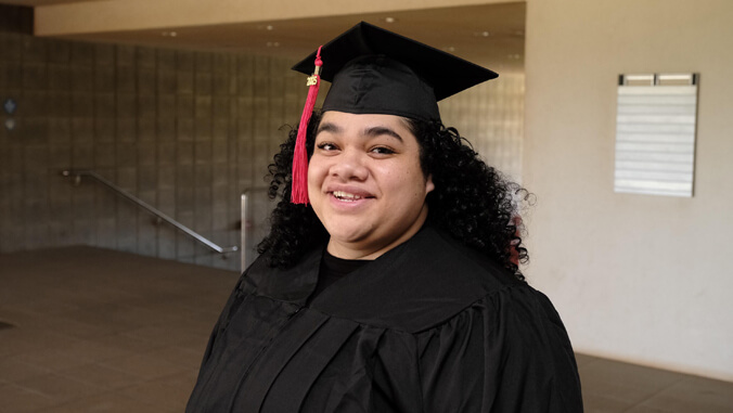 Tanya Patricia Tanuvasa Pio in cap and gown