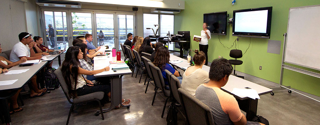 Students listening to instructor in a classroom