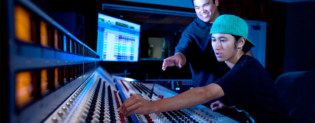 two young men in a music studio