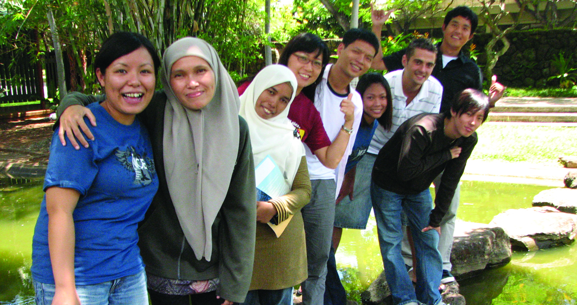 International students waving