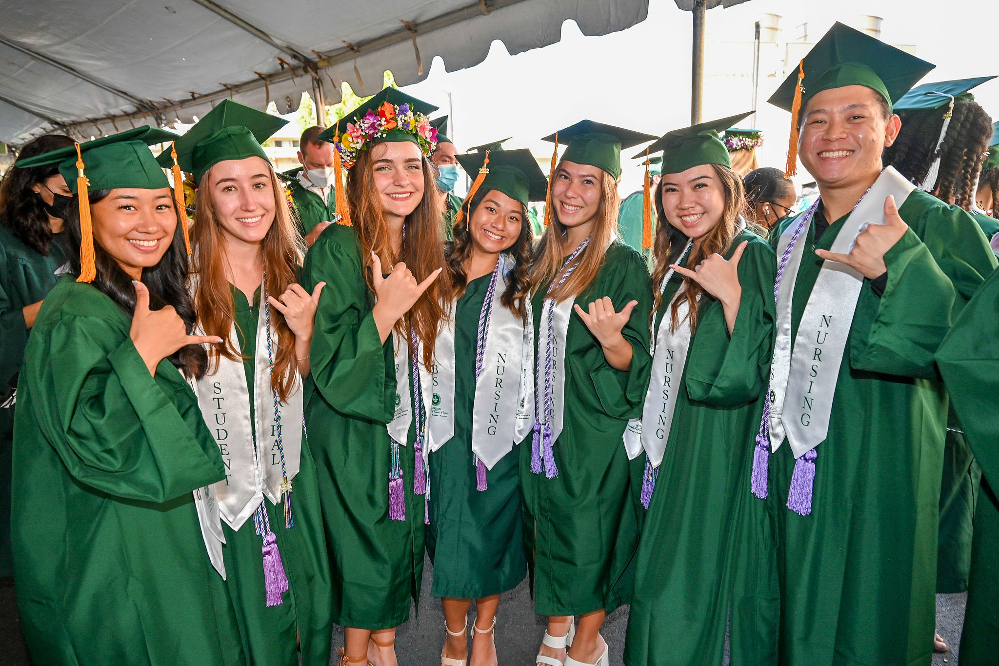 graduates smiling